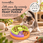 Kitten playing with the Fernwellpets Kitty Layered Feast Puzzle Feeder